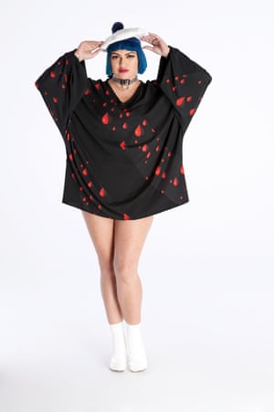 A top with the nail varnish print.