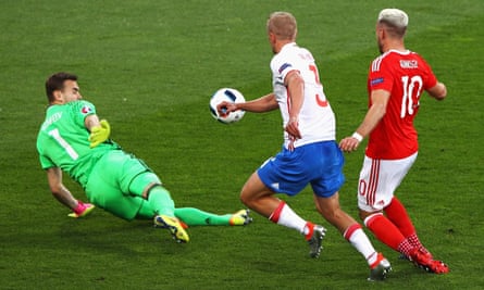 Aaron Ramsey scores the opening goal for Wales in the 3-0 victory over Russia at Euro 2016