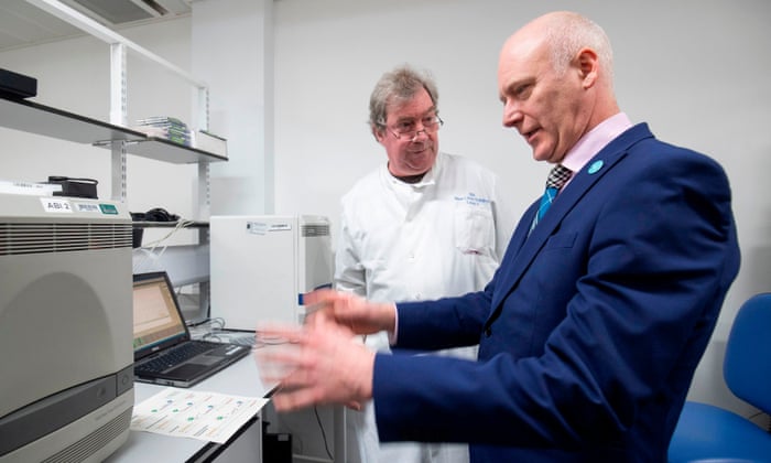 Scotland’s public health minister Joe FitzPatrick meets technical section manager Graeme Gillespie during a visit to the coronavirus testing laboratory at Glasgow Royal Infirmary.