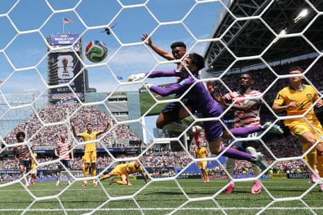 Alex Freeman scores a header