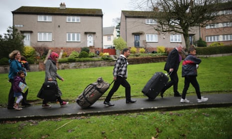 Syrian refugee families arrive at their new homes on the Isle of Bute in Scotland in December