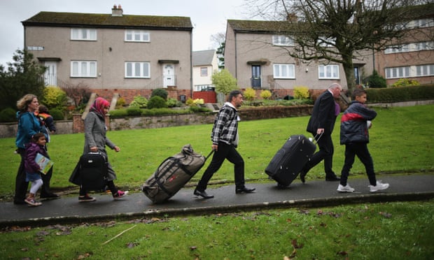 Syrian refugee families arrive at their new homes on the Isle of Bute in Scotland in December