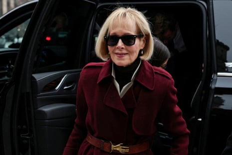 A woman in a red coat and sunglasses exits a vehicle
