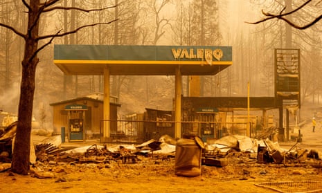 A burned Valero gas station smolders during the Creek fire in an unincorporated area of Fresno County, California on Tuesday.