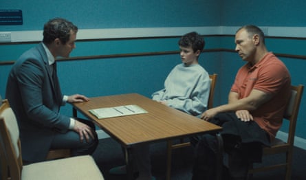 Mark Stanley, from left, Owen Cooper and Stephen Graham in a scene from Adolescence.