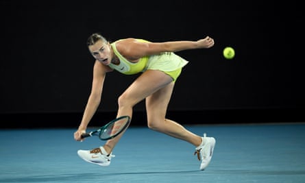 Aryna Sabalenka stretches to return the ball to Madison Keys
