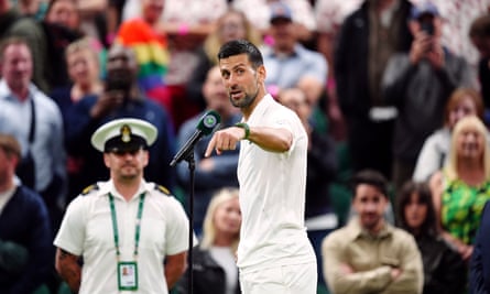 Novak Djokovic reacts to the crowd after his victory