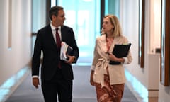 Australian Treasurer Jim Chalmers and Australian Finance Minister Katy Gallagher arrive to speak to media during a press conference at Parliament House