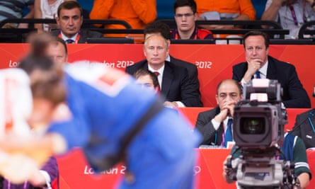 David Cameron and Vladimir Putin watch judo at the London Olympics