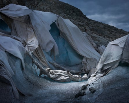 Shroud, 2018, by Simon Norfolk and Klaus Thyman:in an attempt to arrest the melting of the ice at an ice-grotto tourist attraction at the Rhône Glacier, local Swiss entrepreneurs paid for it to be covered up with a thermal blanket. ‘We chose the title,’ says Norfolk, ‘because it looks like they have created a shroud for the glacier’s death’