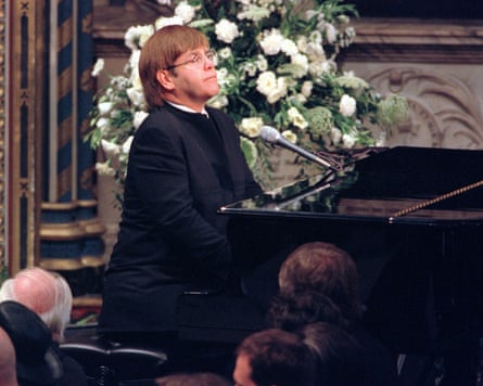 Elton John at the piano plays a specially rewritten version of Candle in the Wind at Diana's funeral service.