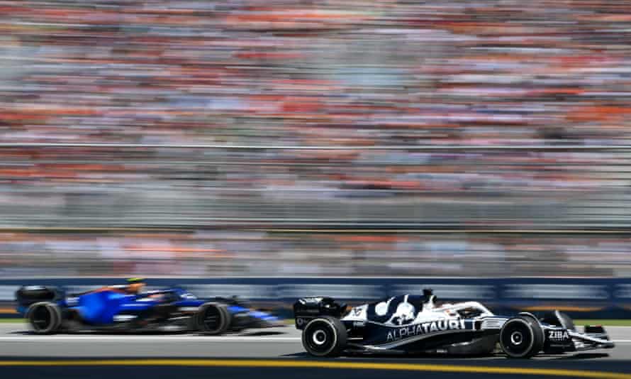 Pierre Gasly of France driving the (10) Scuderia AlphaTauri AT03 leads Nicholas Latifi of Canada driving the (6) Williams FW44 Mercedes