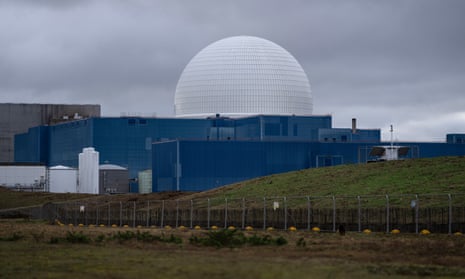 Sizewell B nuclear power station stands behind a fence marking the site of the under-construction Sizewell C