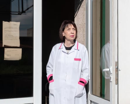 Doctor at the door of her clinic