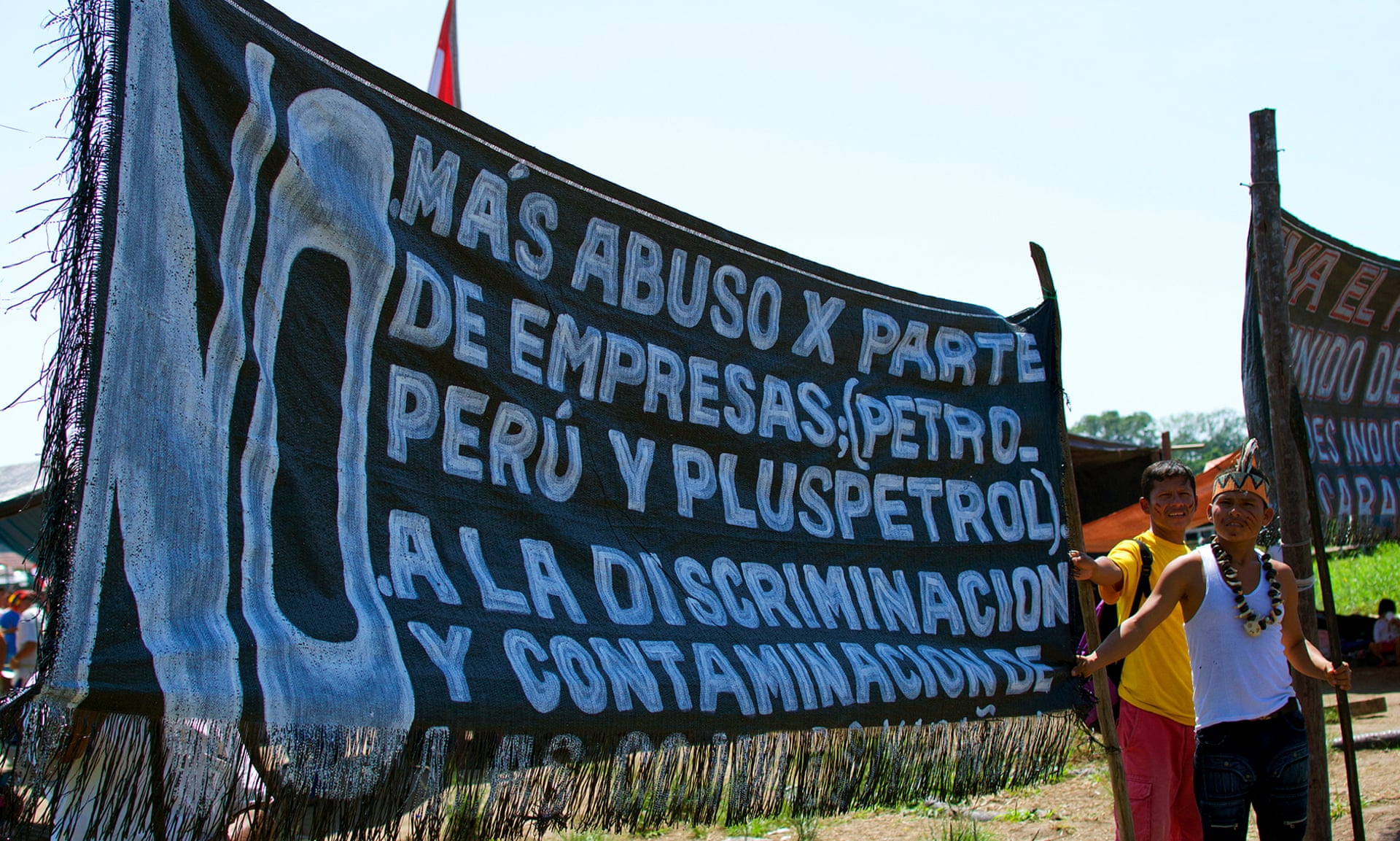 Banner denouncing Pluspetrol in the Saramurillo indigenous community in October 2016. Photograph: Sophie Pinchetti/The Chaikuni Institute