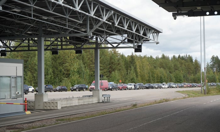 Cars queue to enter Finland from Russia at Finland's most southern crossing point Vaalimaa.
