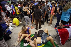 Very relaxed fans wait patiently to enter the venue where the Rolling Stones will play
