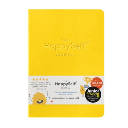 Yellow notebook with ‘The Happyself Journal’ on cover