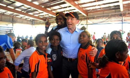 Former prime minister Tony Abbott in Yirrkala duringa visit to remote communities in 2014. His successor has made more low-key contacts with Indigenous Australians.