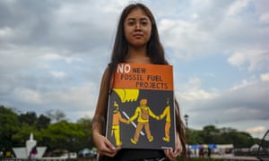 Environmentalists and concerned citizens protest in Quezon City to demand climate action.