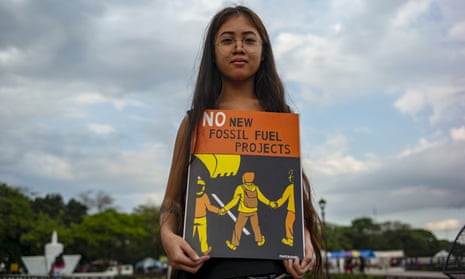 Environmentalists and concerned citizens protest in Quezon City to demand climate action.