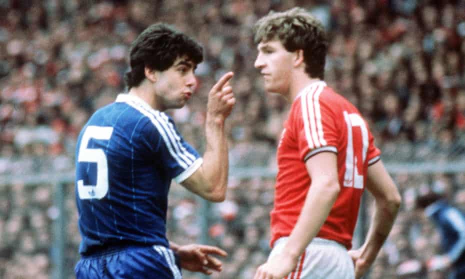 Brighton’s Gary Stevens has words with Manchester United’s Norman Whiteside during the FA Cup final at Wembley. Brighton were relegated before losing to United in a replay.
