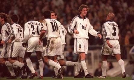 Real Madrid’s Steve McManaman celebrates a goal against Malaga with Roberto Carlos in February 2001