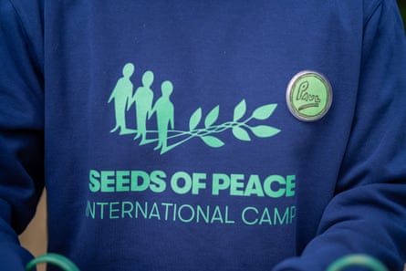 CU of Seeds of Peace logo on a sweatshirt