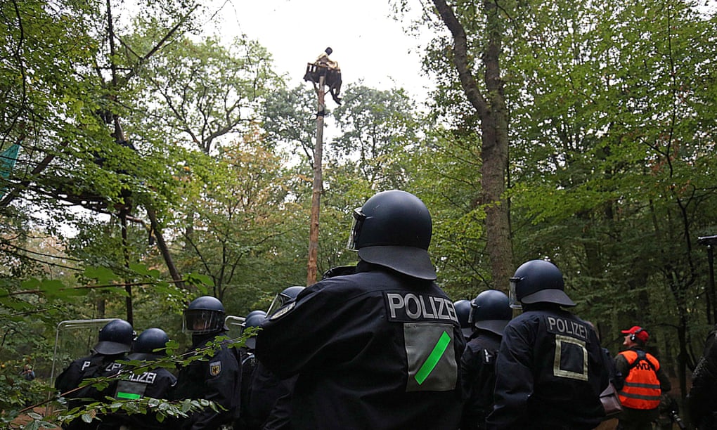 Protester on pole