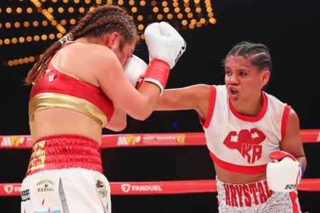 Krystal Rosado (right) lands a punch to the head of Fernanda Reyes during their bantamweight bout on Friday night.