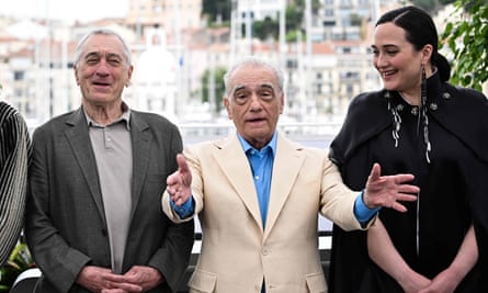 Robert de Niro, Martin Scorsese and Lily Gladstone pose during a photocall in Cannes