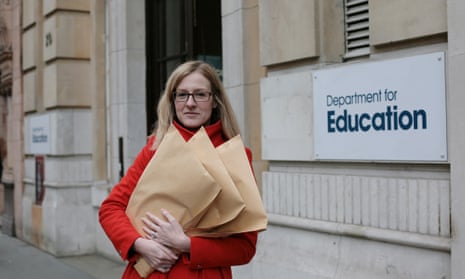 Laura McInerney and documents, outside the Dept. for Education