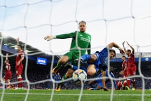 Leicester’s Shinji Okazaki scores, despite the efforts of Simon Mignolet as Liverpool win 3-2 at The King Power Stadium.