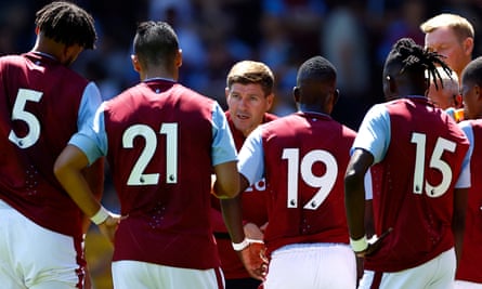 Aston Villa manager Steven Gerrard speaks to the players during a break in play in a pre-season game against Walsall in July.