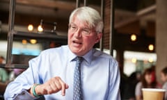Andrew Mitchell talking in a restaurant