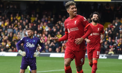 Roberto Firmino celebrates scoring Liverpool’s third goal as Mohamed Salah runs to celebrate and Ben Foster looks on forlornly