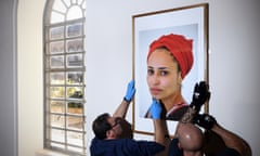 A portrait of novelist Zadie Smith in hung in the University of Cambridge Library as part of a 2018 exhibition called Black Cantabs: History Makers.
