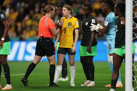 Referee Esther Staubli talks to Cortnee Vine