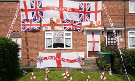 A home adorned with the St George and Union flags