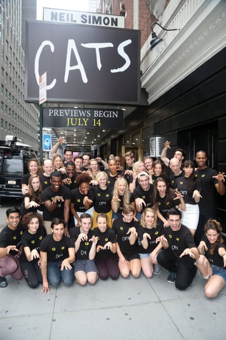 Leona Lewis and the cast pose outside the theatre.
