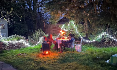 A guest enjoys Katie Glass’s garden.