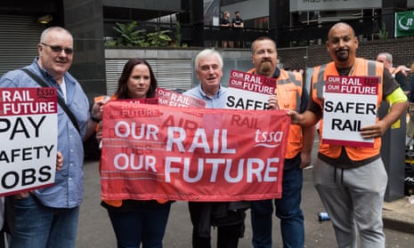 A picture of John McDonnell MP (centre) joining the picket line outside Euston Station as railway workers stage an earlier 24-hour walk-out on 27 July.