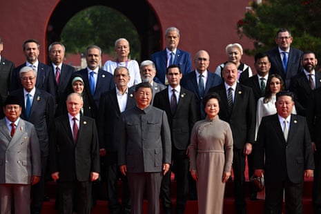 Daniel Andrews (top right) poses with leaders including Russian president Vladimir Putin, Chinese president Xi Jinping and North Korean leader Kim Jong-un.