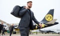 Niclas Füllkrug arrives at Luton Airport