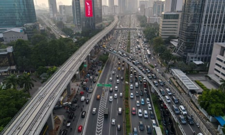An aerial view shows motorists commuting on a highway during the afternoon rush hour in Jakarta.