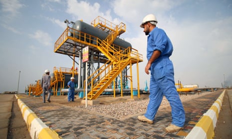 Oil workers in Nasiriyah, Iraq, which has ramped up output recently.