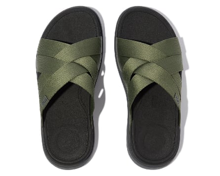 A pair of Fit Flop F-mode strappy slides in black and dark green.