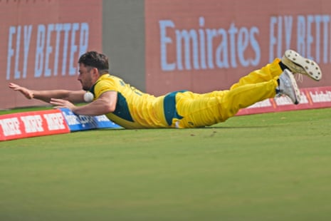 Stoinis dives unsuccessfully to stop a boundary.