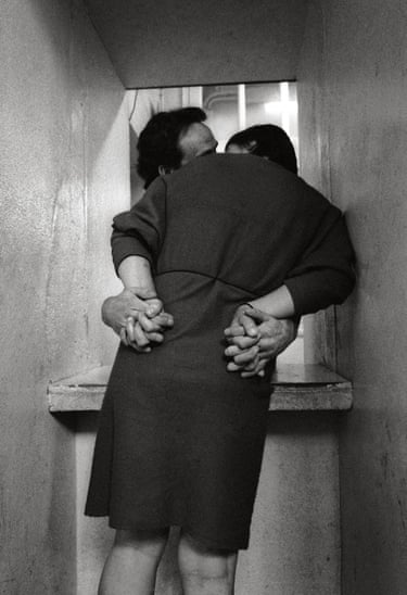 Black and white photograph of an unidentified couple mid embrace