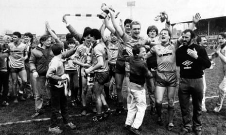 Celtic players and supporters celebrate winning the title at St Mirren in 1985-86. The man who made it possible, Dundee’s Albert Kidd, became a Celtic legend.
